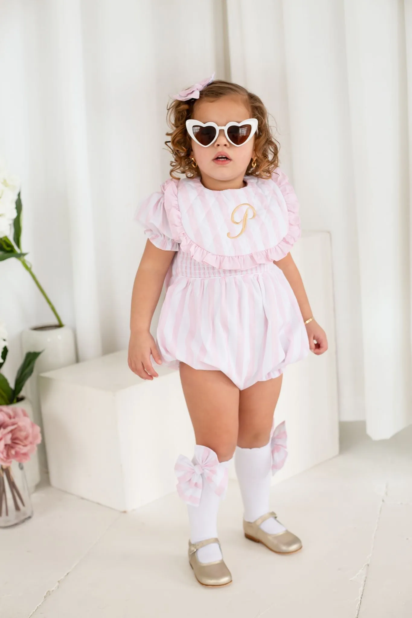 Girls Pink Candy Stripe Smocked Romper