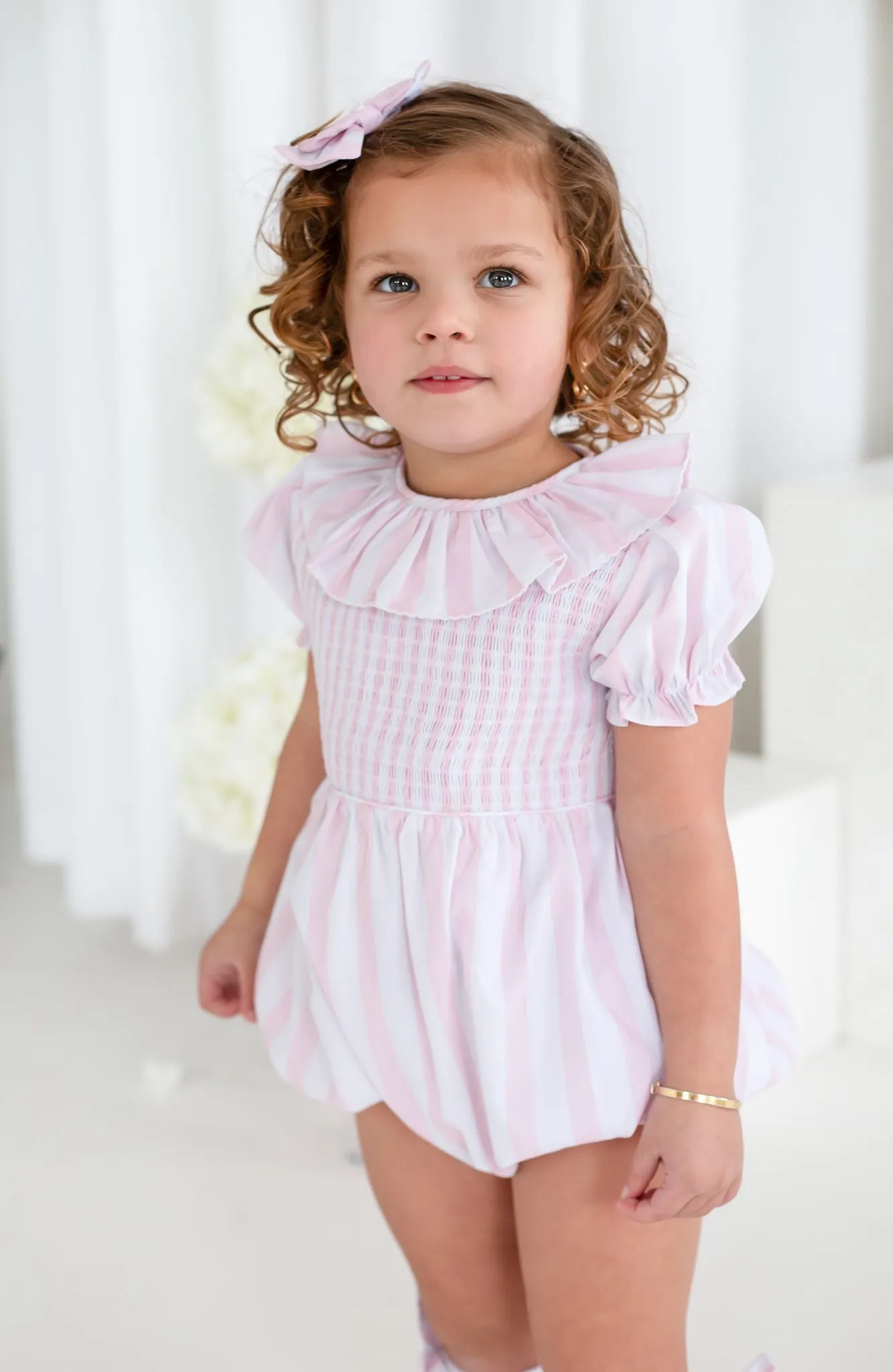 Girls Pink Candy Stripe Smocked Romper