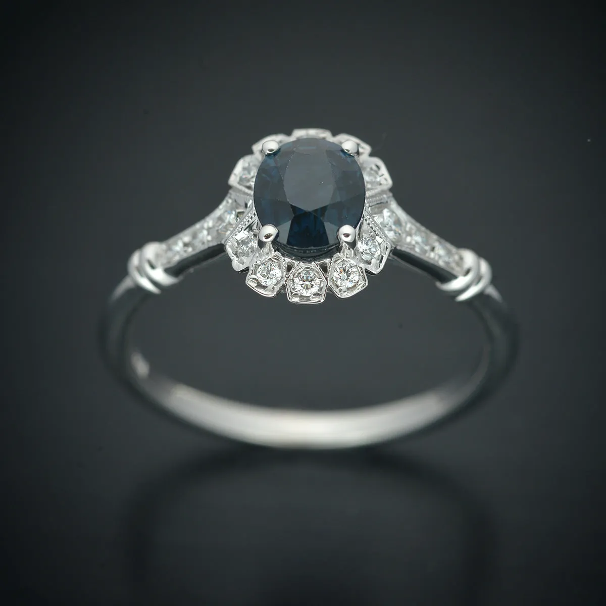 Haydee Sunny Oval Blue Sapphire halo engagement ring