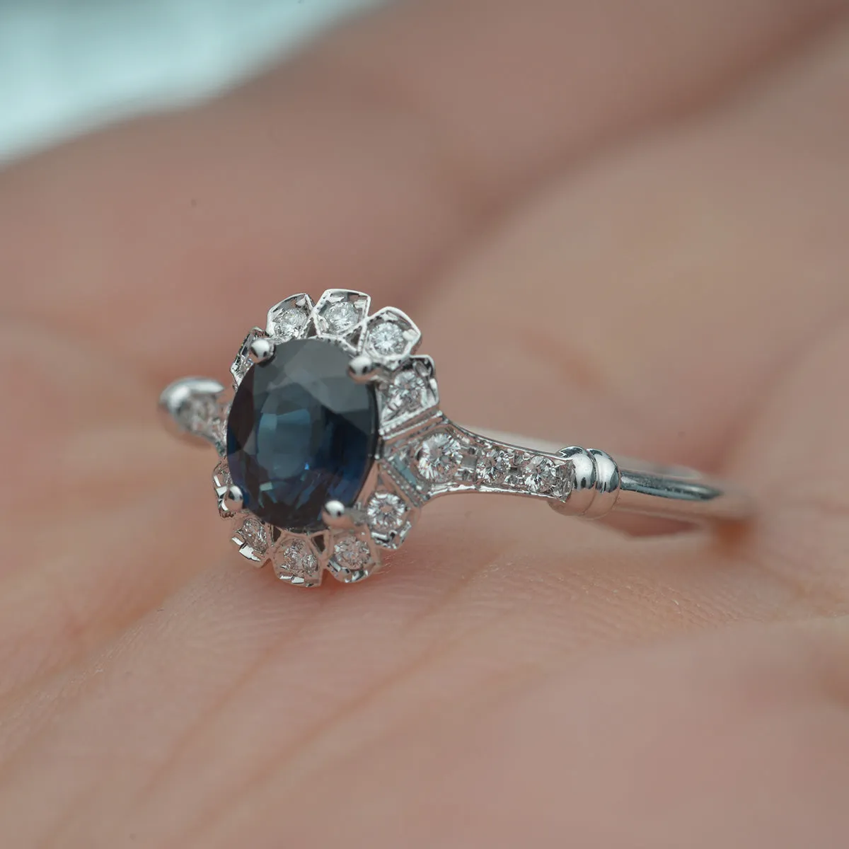 Haydee Sunny Oval Blue Sapphire halo engagement ring